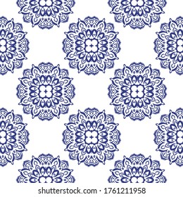 Fantasy seamless pattern with ornamental mandala. Abstract round doodle flower background. Floral geometric circle. Vector illustration.   