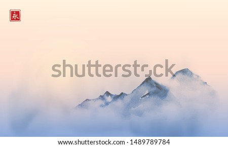 Far mountains over the dense fog and sunrise. Traditional oriental ink painting sumi-e, u-sin, go-hua. Hieroglyph - eternity