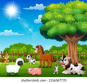 Farm animals are enjoying nature by a fence