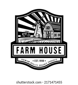 Farm house in green field with windmill and farming old tractor badge design