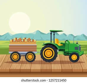 farm tractor pushing fruits with cart