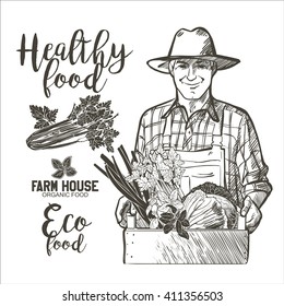 Farmer carrying a wooden crate full of fresh vegetables and herbs