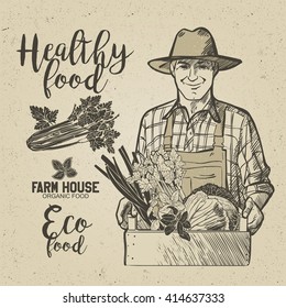 Farmer carrying a wooden crate full of fresh vegetables and herbs