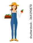 Farmer collecting apples.
