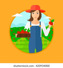 Farmer collecting apples.