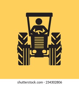 farmer driving tractor