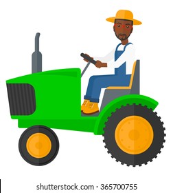 Farmer driving tractor.