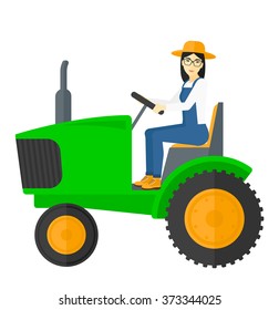 Farmer driving tractor.