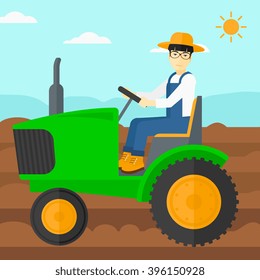 Farmer driving tractor.