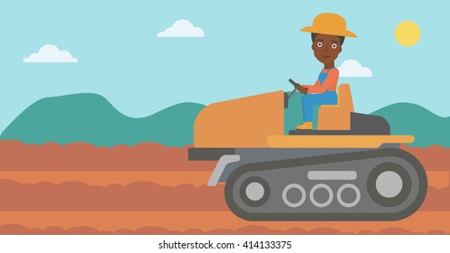 Un granjero conduciendo un tractor.