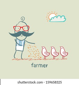 farmer feeds chickens
