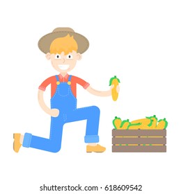 Farmer in hat dressed in a blue jumpsuit with corns