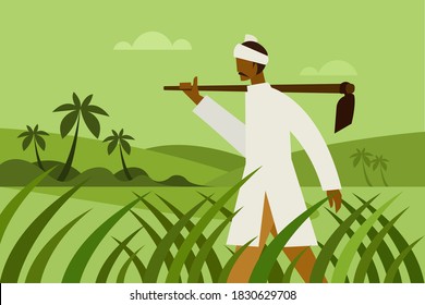 A farmer holding a spade walks through a farm