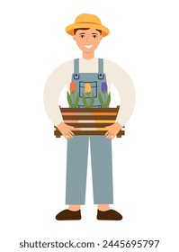 Farmer holding wooden box with flowers, tulips isolated on white background. A man in overalls and a hat is gardening. Vector illustration of a man gardener in cartoon flat style.