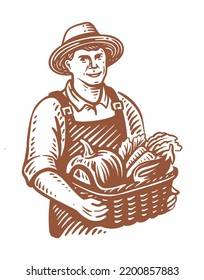 Farmer holds basket of vegetables. Autumn harvest