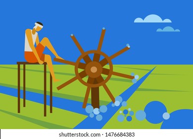Farmer irrigates a paddy field using traditional water wheel