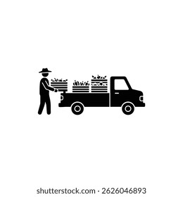 Farmer loading crates of vegetables into the back of a truck