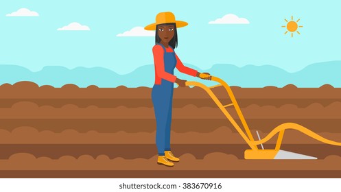 Farmer on the field with plough.