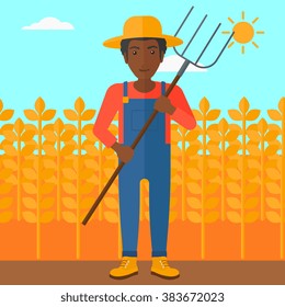 Farmer with pitchfork.