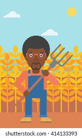 Farmer with pitchfork.