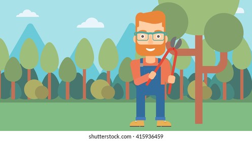 Farmer with pruner in garden.