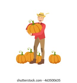 Farmer With Pupmpkins Holding One In Hands