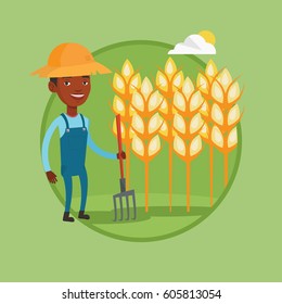 Farmer in summer hat standing with a pitchfork on the background of wheat field. Farmer working with pitchfork in wheat field. Vector flat design illustration in the circle isolated on background.