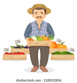 Farmer with wooden boxes of fresh vegetables for market