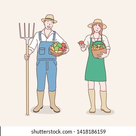 Farmers, man and woman, cartoon characters, set. Beautiful lady gardener with basket full of vegetables and handsome gardener with apple. Hand drawn style vector design illustrations.