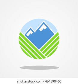 Farming type logo template mount in the middle of green field design illustration
