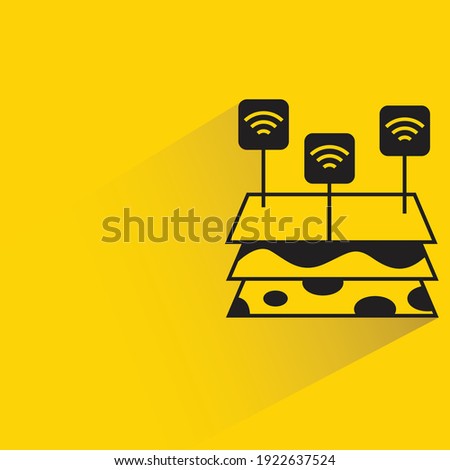 farmland and wifi sensor with shadow on yellow background