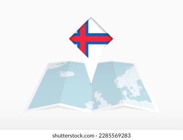 Faroe Islands is depicted on a folded paper map and pinned location marker with flag of Faroe Islands. Folded vector map.