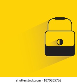 fashion bag with drop shadow on yellow background