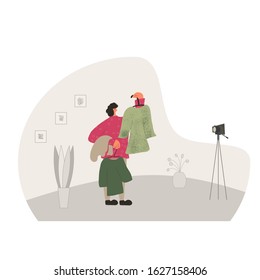 Fashion blogger. Person showing vintage dresses against camera on tripod. Vector flat illustration.