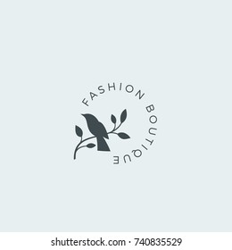 Fashion Boutique Abstract Vector Sign, Symbol or Logo Template. Bird on a Branch Silhouette with Modern Typography. Premium Feminine Emblem. Good for Beauty Salon, SPA, Wedding Boutiques. Isolated.