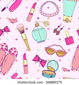 Fashion and cosmetics. Cute seamless pattern with feminine accessories.