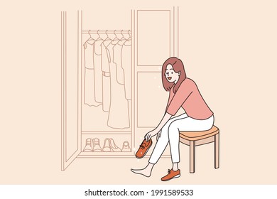 Fashion and fitting new shoes concept. Smiling positive pretty lady cartoon character sitting in showroom fashion collection choosing shoes clothes vector illustration 