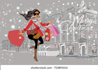 Fashion girl in a hat and in  a coat  shopping in the street of the old city. Christmas card.