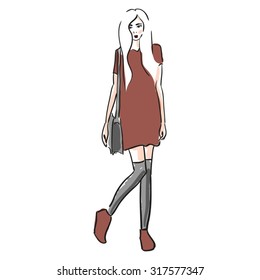Fashion girl standing in dress and stockings