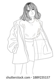 Fashion girl wearing sweater outdoors