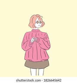 Fashion girl wears a pink sweater and sunglasses.