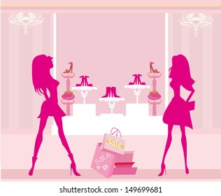  Fashion girls shopping in shoe shop 