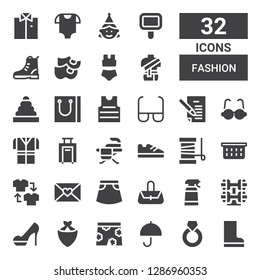 fashion icon set. Collection of 32 filled fashion icons included Boots, Ring, Umbrella, Short, Kerchief, Heels, Bracelet, Desinfectant, Hand bag, Skirt, Letter, Shirt, Laundry basket