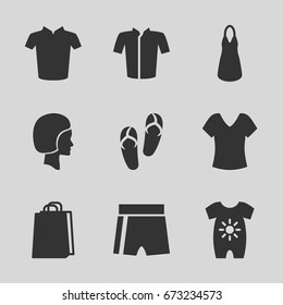 Fashion icons set. set of 9 fashion filled icons such as baby onesie, flip flops, shirt, dress, t-shirt, jacket, shopping bag, face