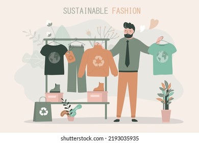 El hombre de la moda elige camisetas hechas de material reciclado. El tipo compra suéter en una tienda ecológica. Percha con varias ropas éticas. Concepto de moda sostenible y tecnologías ecológicas. Vector plano