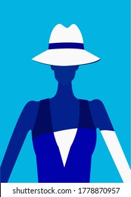 Fashion model in a white hat and a blue dress on an aquamarine background. Portrait of a girl in a hat on an aquamarine background. Stylish woman dressed in a blue dress and white hat.