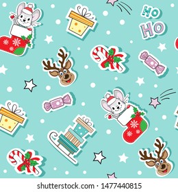Fashion patch badges with christmas items, a cute mouse, a gift, deer, sled with gifts  on a blue background seamless pattern