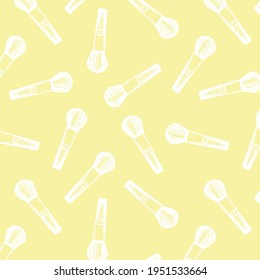 Fashion pattern with white makeup brush  pattern on yellow background