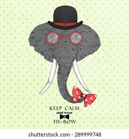 fashion portrait of elephant in bowler hat and bow-tie