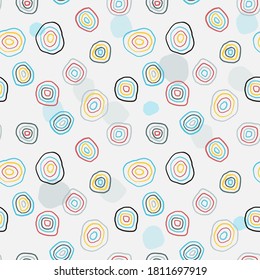 Fashion print seamless pattern. Vector design with colorful hand drawn sketchy circles. Blue, yellow and red.
